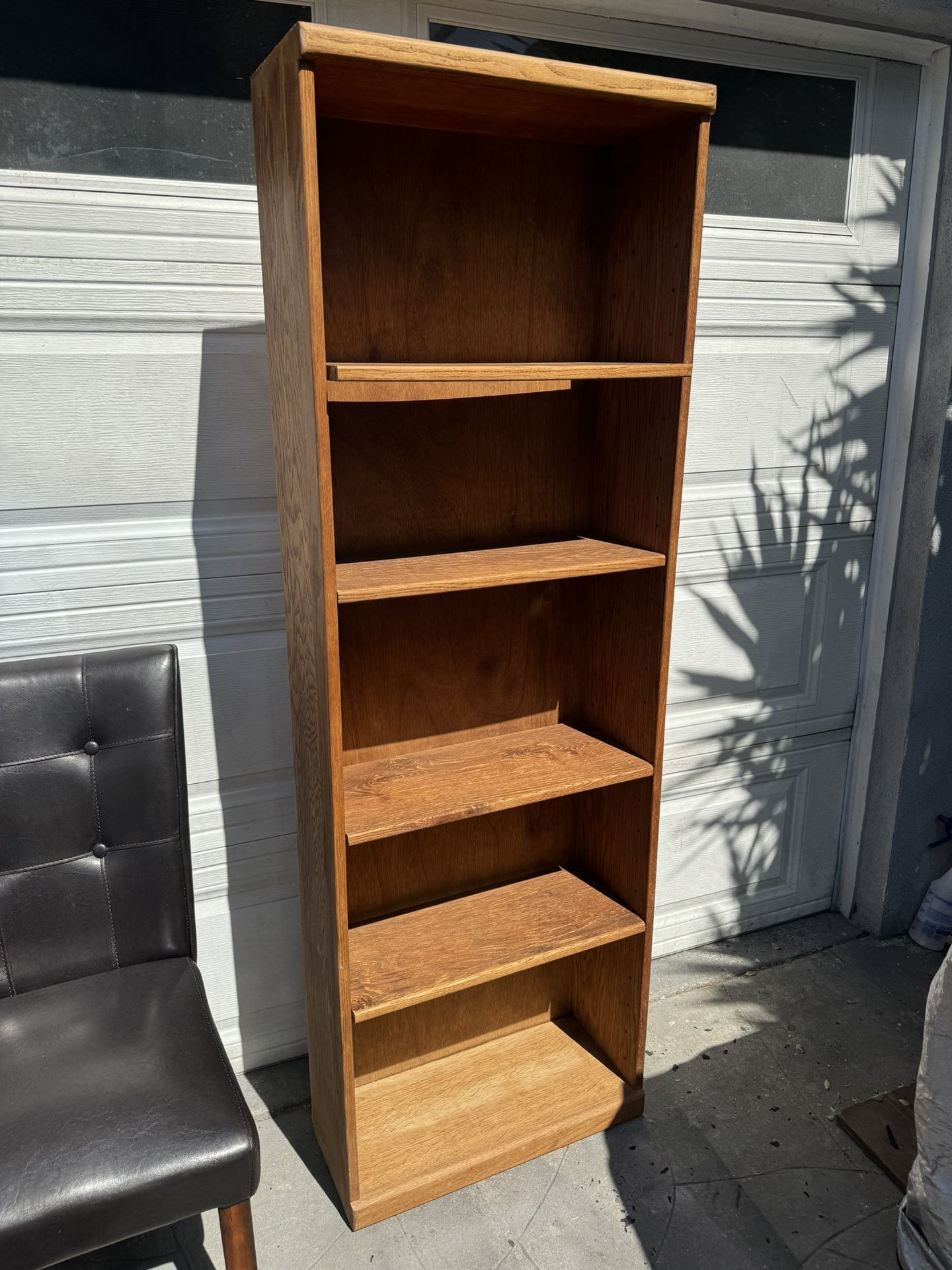 Solid wood 5-layer shelf bookcase . excellent condition measurements 10 deep x 24 1/2W x  72H.