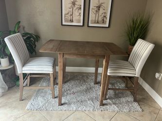 In new conditions Table with 2 matching Chairs