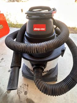 Shop - vac, vacuum.