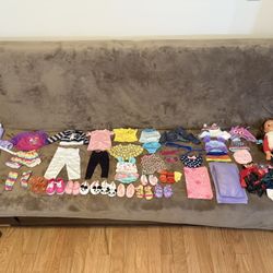 American Girl / Soft body/ lots of clothes and accessories. 18-inch 