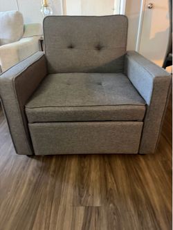Gray small recliner