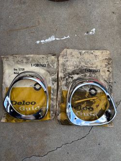 1963 impala Headlight Bezels #(contact info removed) driver side