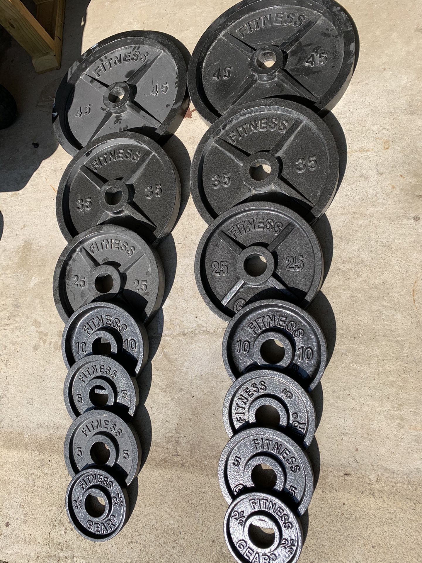 255 Pounds of Olympic Weight Plates