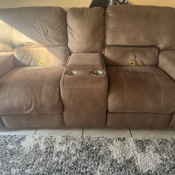 Couches and recliners installed in them