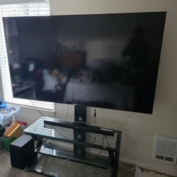 75" TCL HDMI TV With Stand And LG Sound Bar With Woofer 