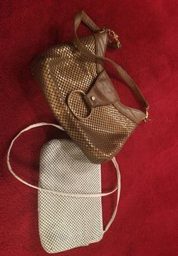 Two vintage Whiting and Davis purses. Both have the original labels.