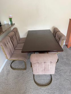 Rectangular dining table with chairs and extensions
