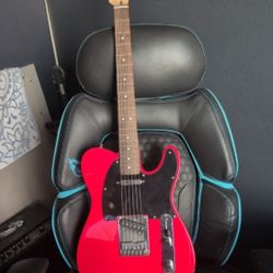 Fender Mustang Lt25 Amp, Alongside A Fender Squire Telecaster 