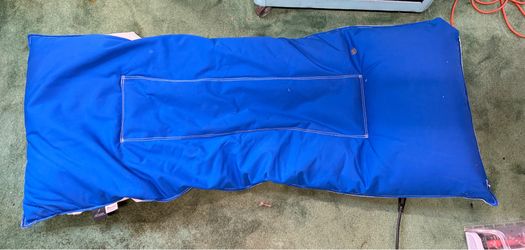 Two Sunbrella Pool Floats