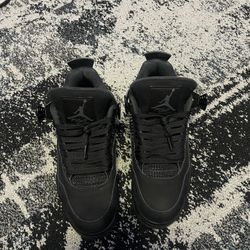 Black Cat Jordan 4s