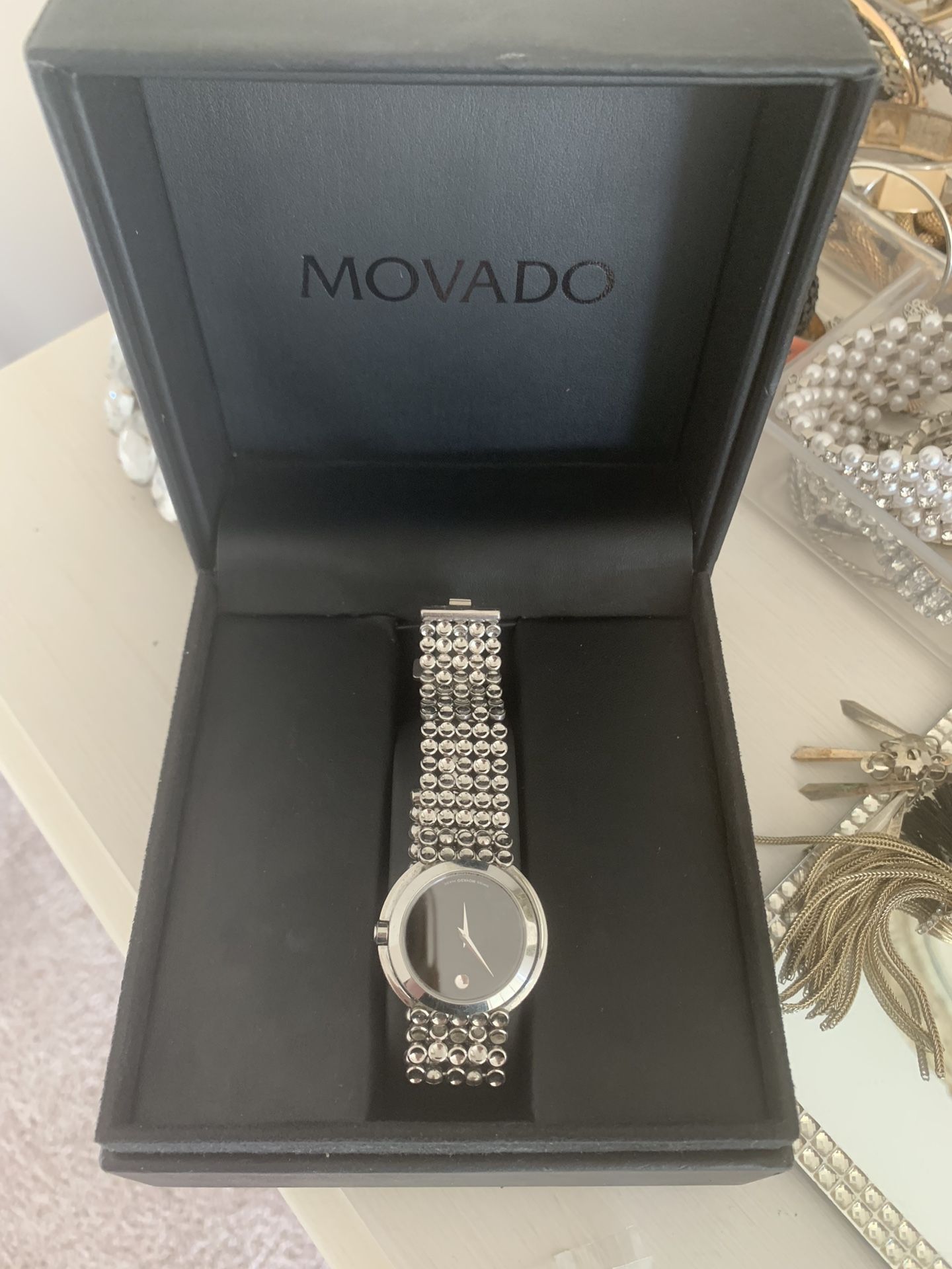 Movado watch almost brand new comes in original box