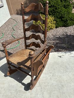 Vintage American rocking chair with magazine rack