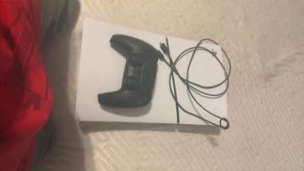 Selling ps5  with wire  and controller wireless controller dad gave on birthday