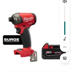 M 18 Milwaukee Impacts And Batteries. 2 Surge Impacts And 1 Original Impact. 3 Batteries, 4,5,8amps.  One Charger.  Possibly A  M18 Dome Light  L $👍