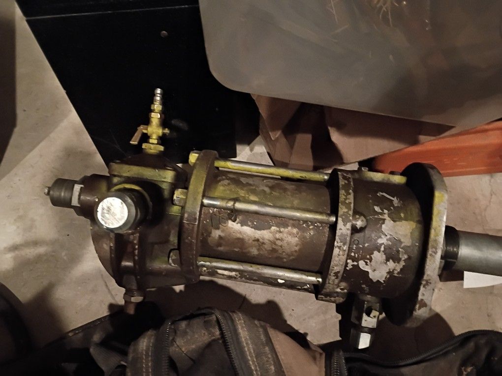 Grease Pump And Hose Reel