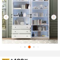 BRAND NEW IN BOX BOOKCASE WITH GLASS DOORS AND LED LIGHTS , DRAWERS AND ADJUSTABLE SHELVES 