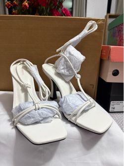 Lace up low heeled heels