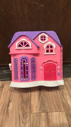 Pink and Purple Plastic Toy Dollhouse