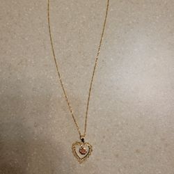14 K Gold Necklace With 14k Gold Pendant.  Weight Is 3.3 Grams 