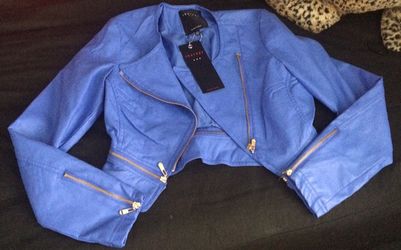 New leather jacket Color is like a blue/purplish shade size M
