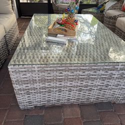table with glass cover and fire pit 