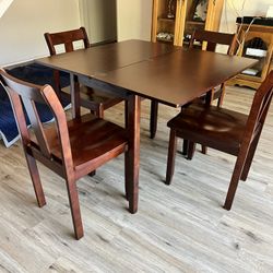 Foldable Table And Matching Chairs 
