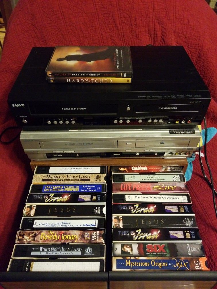 2 VCR/DVD Players And Assorted VHS Tapes