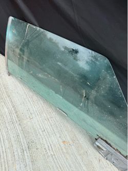 original 1969 front windows glue in