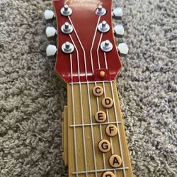 Air Guitar Inspire Music Electronic Handheld Device Interactive Toy Preset Songs