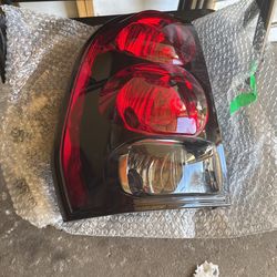 LEFT TRAILBLAZER TAIL LIGHT 