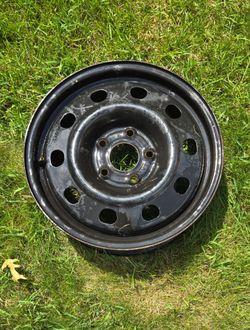 Four 17 inch steel rims from a Dodge 2017 journey