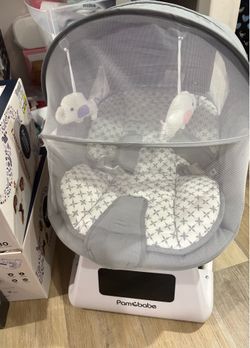 Brand New baby swing gender neutral ( pink, and purple elephants can be removed )