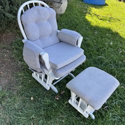 White rocking nursery chair with stool