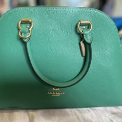Never Used Coach purse 
