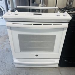 GE white electric stove with a receipt and 60-day warranty