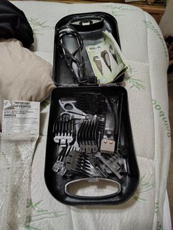 WAHL HAIR TRIMMER WITH FACIAL HAIR TRIMMER INCLUDED.