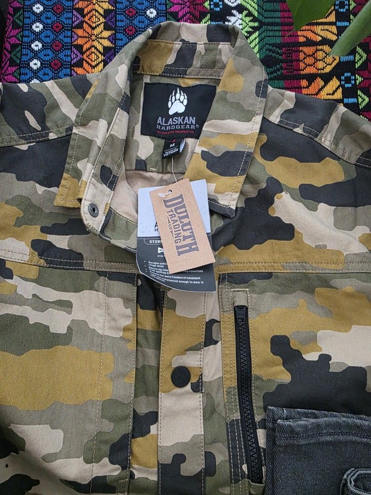 Camouflage Jacket/ Black Jeans $40