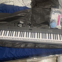 Starfavor 88 Key Piano Keyboard With Piano Pedal, Carrying Bag, Stand, And Recording/MIDI/USB