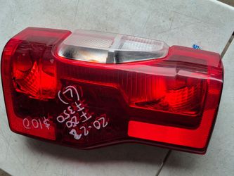 Ford f250 left tail light oem