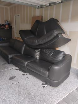 3 piece Black leather sofa