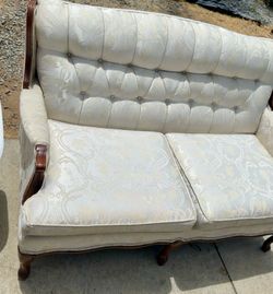 traditional tufted loveseat