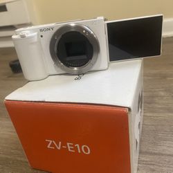 ZV-E10 Vlogging Camera With Charger And Neck Strap To Support Camera While Shooting 
