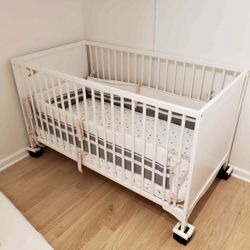 Ikea white baby crib + mattress