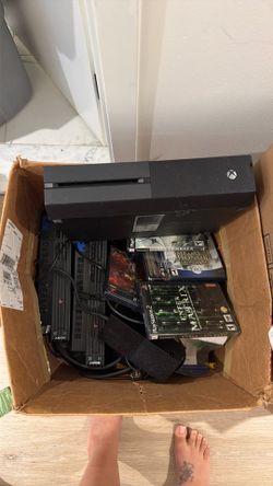 Two Ps2 consoles and a old Xbox