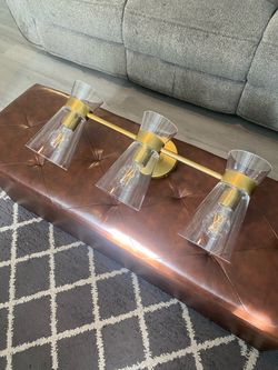 Gold and glass light fixture