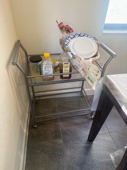 Silver Metal and Glass 2-Tier Rolling Cart