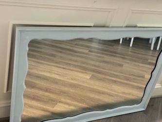 Large vintage mirror updated in light coastal style