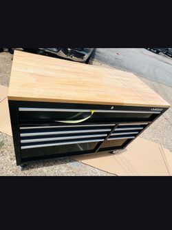 Husky 52 in. W x 25 in. D Standard Duty 9-Drawer Mobile Workbench Tool Chest with Solid Wood Top in Black. New open box item