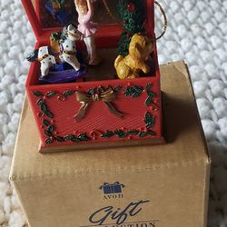 1996 AVON Gift Collection Musical Toy Box Christmas Ornament.