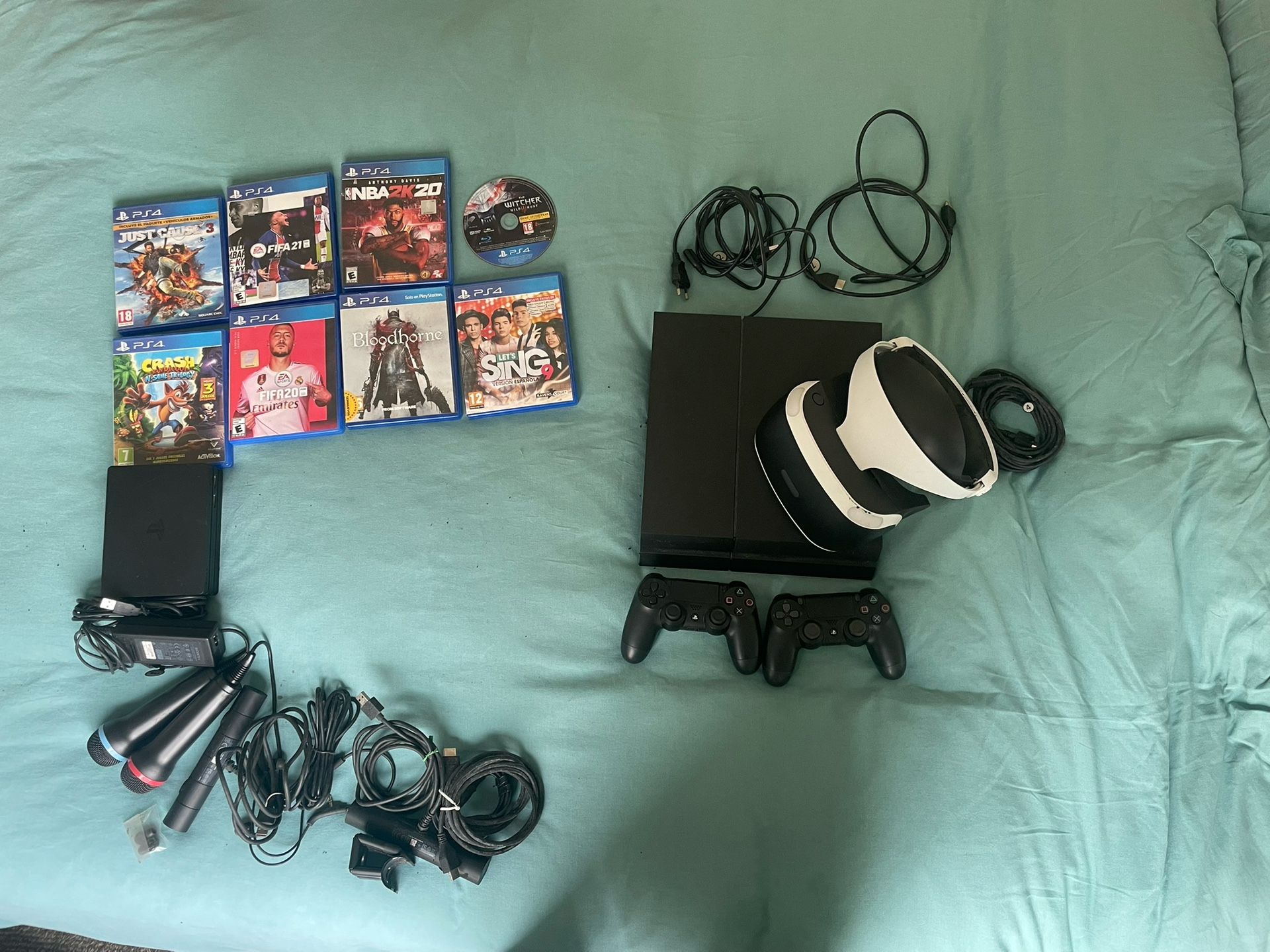 PS4 With 2 Remotes, VR, Mics, Games